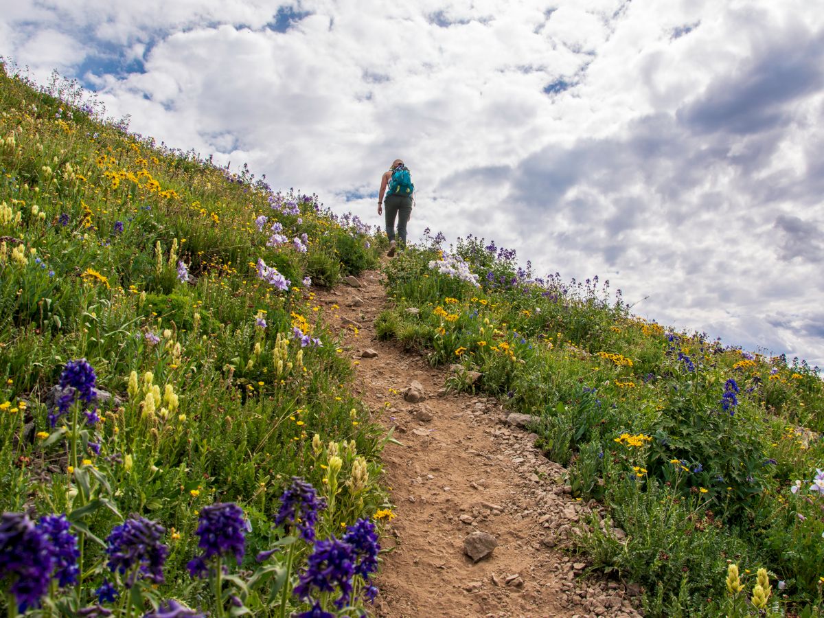 Girl hiking in Telluride Colorado near Hotel Columbia Telluride